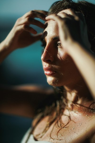 Woman's face at the beach, front view