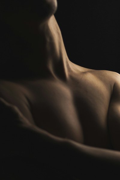 Close-up of a man's upper chest and neck