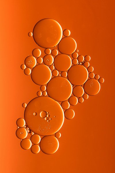 Close-up of droplets on an orange background
